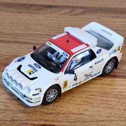 SCALEXTRIC FORD RS200. IN NEAR MINT CONDITION.  THIS IS A SET CAR, HENCE NO BOX  BUT I CAN SUPPLY ONE OF REQUIRED. THIS CAR HAS NEVER BEEN USED.
THE ONLY THING MISSING IS THE AERIAL.
I HAVE TESTED IT USING A 9V BATTERY AND ALL THE LIGHTS WORK. THE MOTOR IS VERY SMOOTH AND QUIET. 
THIS IS AN EXCELLENT EXAMPLE OF A PRETTY RARE LIVERY.
£40.00 ONO
PAYMENT IS BY PAYPAL ONLY PLEASE. 
POSTAGE IS £3.20 AND IS TRACKED.
OFFERS INVITED
