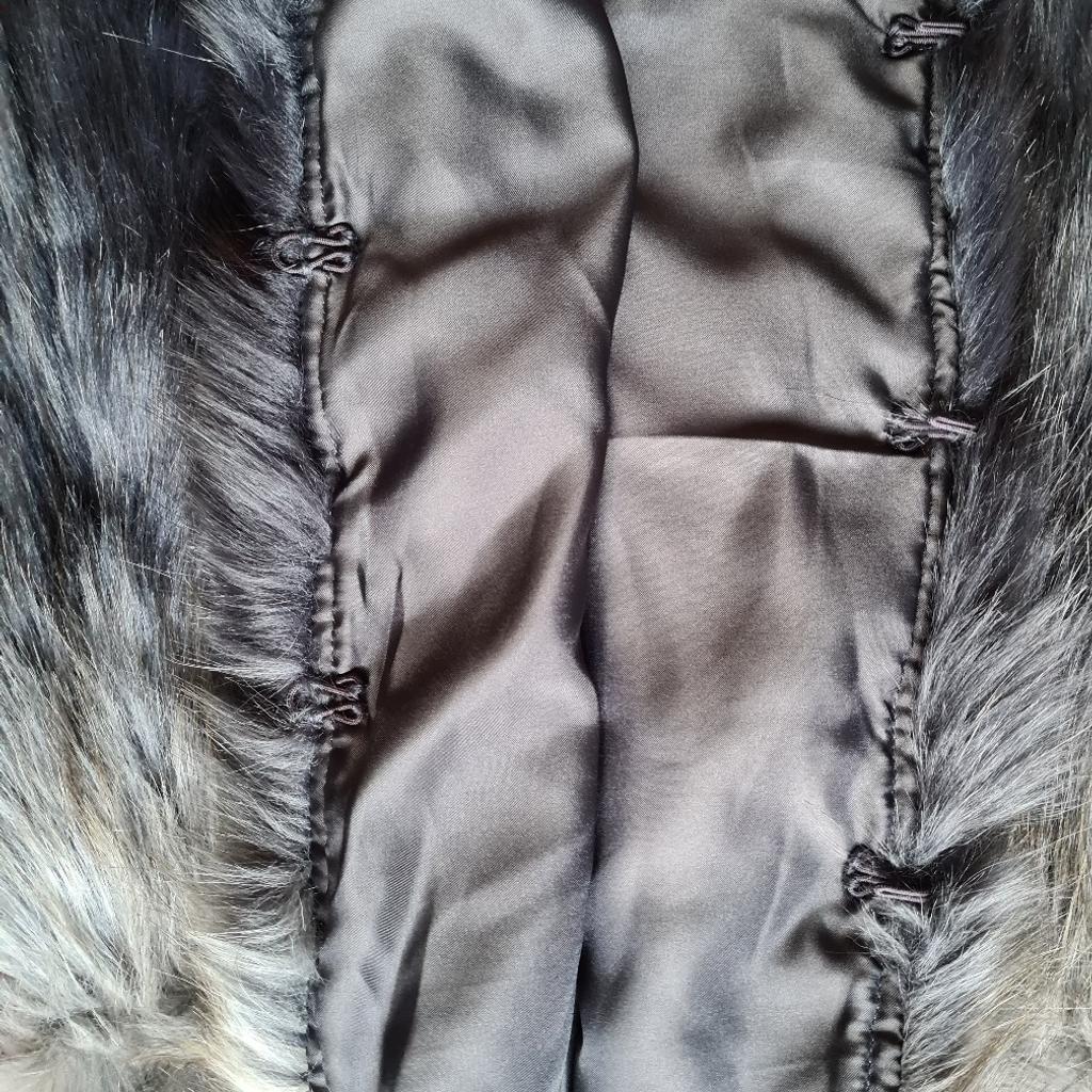 size 8 faux fur gillet hook and eye fastening tags have been removed but has never been worn, smoke free home good condition