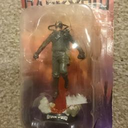dark void capcom figurine. figurine is new but as seen the packaging has wear. aprox 4" in size.