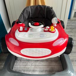 Interactive red car, turn the key to hear the engine splutter, push the gear forward to hear the sound of the car zooming past, 

Been in storage will need a clean, everything works, the lights flash,