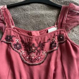 Pink silk and panels are velvet panels on side embroidered on neckline with belt from next size 11 years