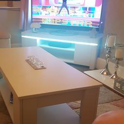 white gloss tv unit with built in led light. Holds up to 50inc tv