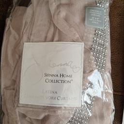Brand new pair voile curtains
Not pink like 2nd photo
Eyelet ring tops
Minky / Neutral beige colour
3 rows of diamante bands at the top
Bought and not good colour for me
From smoke free home
collection or delivery 