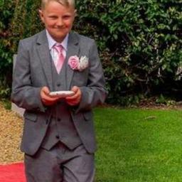 Next suit jacket.
Grey.
Age 9 years.
Only worn once for our wedding.
I would like £5