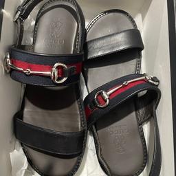 Size 32 authentic Gucci sandals 
Good condition