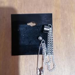 silver earring and ear cuff. brand new never worn