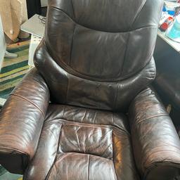 In very good condition, aged leather look , genuine leather with no rips or tears comes with foot stool