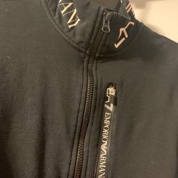Armani zip up top .
Dark blue size 12/14 lots of logo on paid over £100 new