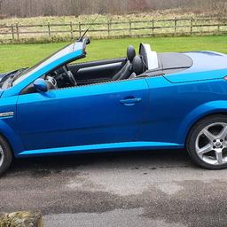 Tigra 1.4 Exclusive Convertible
Top of range and in beautiful condition. Only 51,000 miles so less than 3000 per year !!!
Note. The marks on the photos are NOT  on the car they are on my camera lense.

Blue with Black leather interior.
Will come with 12+ months MOT.
Electric roof and boot fully operational .
Wind deflector for when roof is in lowered position.
Black Leather Heated seats.
Air conditioning.
Radio CD  player.
Ajustable Steering column.
Alarm- Immobiliser system.
Central locking.