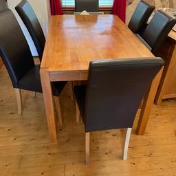 Oak wood heavy table
Good used condition
Table 90x 150cm will be dismantled (legs come off)
Dining chairs x 6 faux leather black

NEED GONE ASAP 
HENCE PRICE