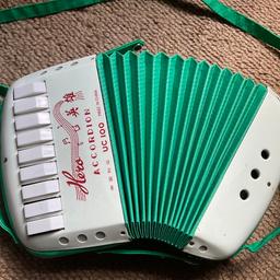 Toy kids accordion. Plays well
