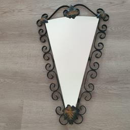 A lovely wrought iron mirror dating from around the 1960s and in good condition. Possible delivery at a cost depending where you are.
