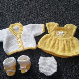 Hand made dolly clothing set

cute little dress with matching bootees in lemon and white
pair of knickers
and a lovely matching cardigafits a 12 to 14 inch baby doll
all hand made using brand new yarn and buttons ect
from a smoke free home
collect or post