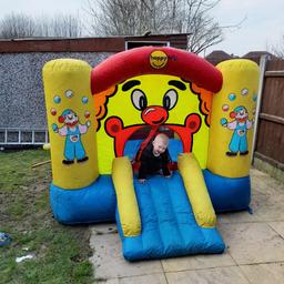 kids bouncy castle all works great could do with a wipe as it's been stored in garage