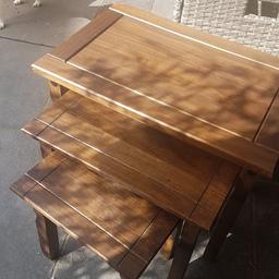 nest of three tables oak colour good condition