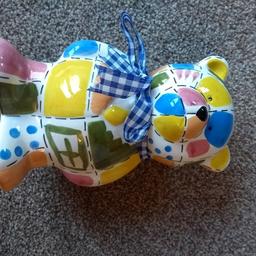 Beautiful Ceramic Money Box - Fab glaze on it - Patchwork design - Ribbon round neck - Stopper included - Never been used - In excellent condition - 16cm / 6.3ins x 10.5cm / 4.1ins - Great for children or adults.