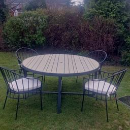 table and 4 chairs in good condition some wear and tear but still good