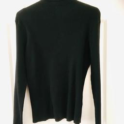 A black long sleeve roll neck soft jumper, an essential in your winter wardrobe. This knitted soft roll-neck jumper is made from a soft, lightweight yarn with a regular fit. Perfect worn on its own tucked into trousers, or worn underneath a cami dress for a chic daytime look. Size an extremely small 20
FreePost or PickUp