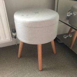 Brand new beige storage stool which also converts into a side table 
Never used but when I opened it there was a mark on the top as shown 
Solid wood legs 
Lid flips so can be used as a stool or side table