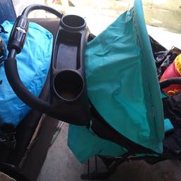 3 wheeled pushchair easy to monovre, one handed closing, cup holders, storage basket. comes with rain over.
