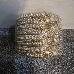 Stunning diamond bangles in gold and silver at a clearance price of £2 each. Size 2.4