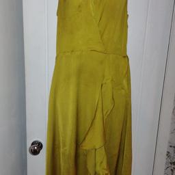 Lovely dress in good condition please see my other items will combine postage