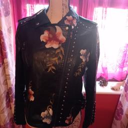 Leather jacket size 16 new.. can deliver if in Barnstaple area..