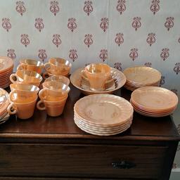 A beautiful vintage style gold set consisting of 11 cups 12 sauces (plates) 1 bowel 18 toast or cake plates 1 sugar bowl 6 larger plate's will deliver local the whole set