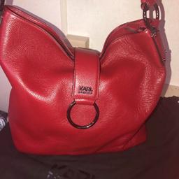 Red large genuine karl largerfeld hobo style bag soft pebble leather in excellent condition only used twice and has just been kept in storage since comes with dust bag any more info please message