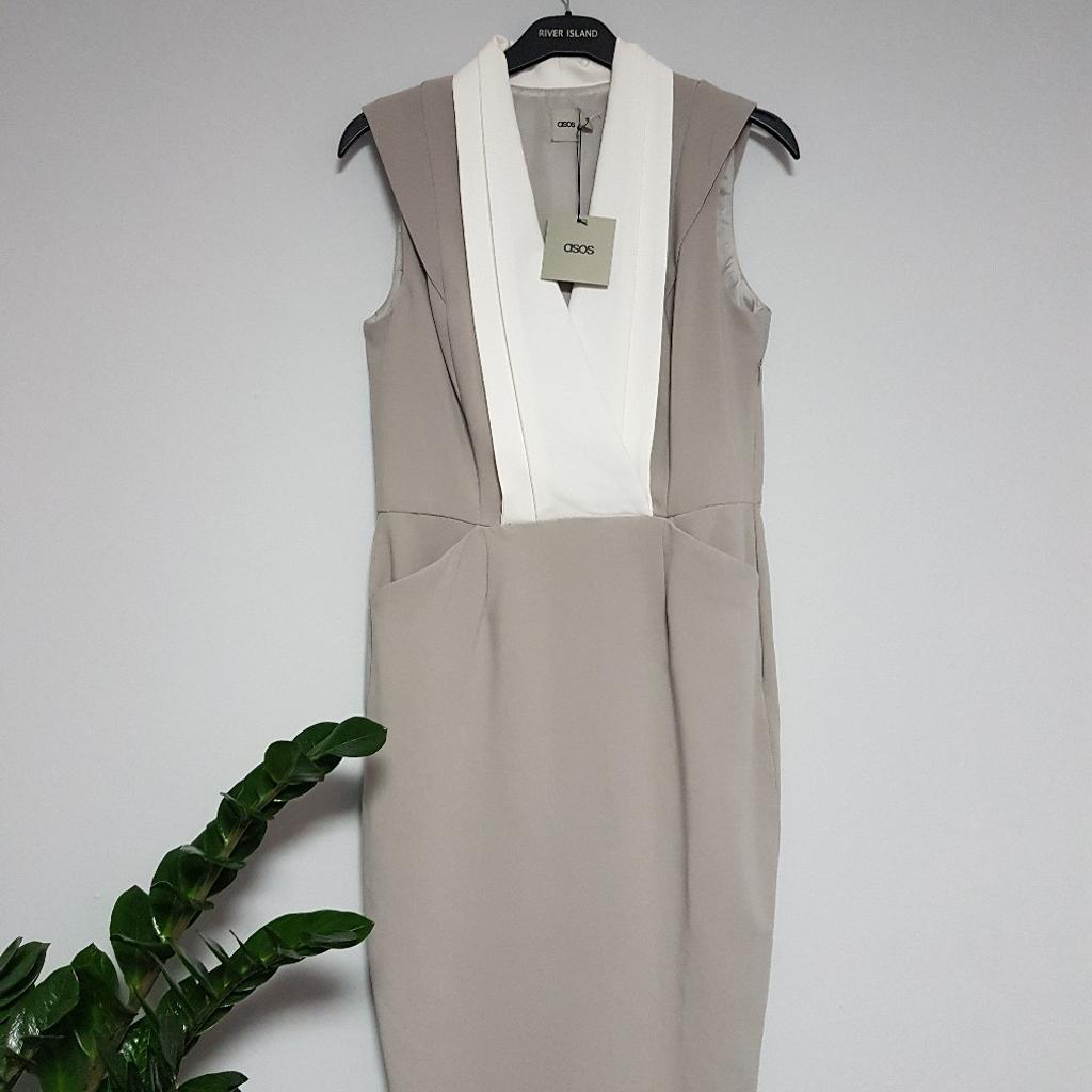 BNWT Asos UK12 dress with pockets. Collection or postage (Royal Mail second class with signature small parcel up to 2kg £4,20). Please have a look on my other items.