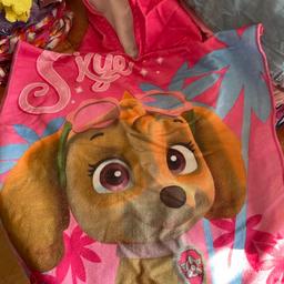 Hooded beach towel for 3-5 year old,  in Paw Patrol character “Skye”.