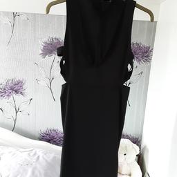 Size 12 very low cut front with strap leading up to choker collar cut out at sides vgc - please see my other items