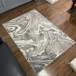 marble effect rug a few different shades of grey nice condition from clean home