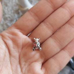 see my page follow me for more 
silver plated tigger inspired charm 
beautiful charm fits pandora chamilia and all similar 
tigger style inspired from winnie the pooh 
sale on my page 
will post or can collect
