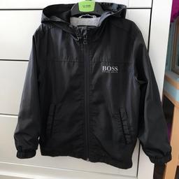 Boys Hugo boss lightweight jacket/windbreaker 
Age 5 
Dark Grey