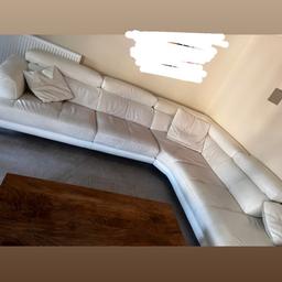 DFS stage corner sofa with adjustable headrests and footstool. General wear and tear. No rips. Very good condition. Few scratches on one corner but not noticeable. Only couple years old. Still being sold in DfS RRP £2799. Looking for £450 ono. Collection only. Needs to be gone by 26th March