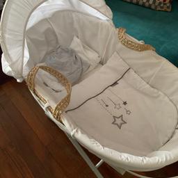 Moses basket with stand for sale, excellent condition, was used as a spare in grandparents home, comes with 4 sheets, thanks for looking
