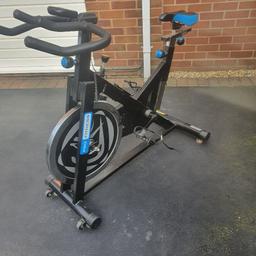 A pro fitness spin bike with digital clock to record distance,time etc.All working fine after home service.