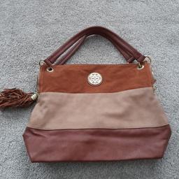 Only used once, unmarked. Large tote shopper from Dorothy Perkins, tan faux leather and suede. Zip fastening with tassle. Double handle. Measures 15 x 12 x 5 inches. Collection from DL5 or post.