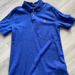 Blue with small orange logo
Size: medium (10-12years) 
Barley worn so in excellent condition 
From smoke free home