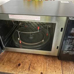 Delonghi combination microwave and grill , touch controls