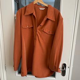 Ladies clothes blouse shirt size 22
Burnt orange  
Excellent condition 
Collection WS10 
Postage 1.63
Bonmarche 
Smoke free home