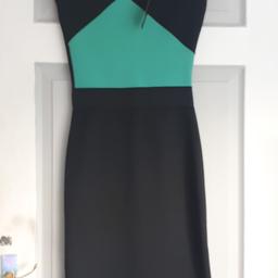 New with tags. fitted dress.size 10