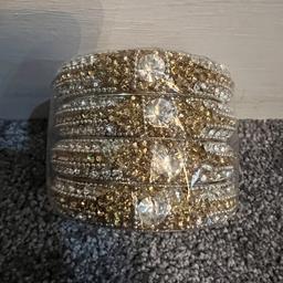 Gold and silver diamond bangles size 2.4. All new