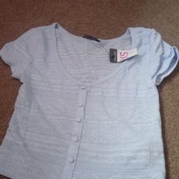 New women's primark top. Size xs with tags. Cost £5. Will post at buyers expense otherwise collection from Tipton