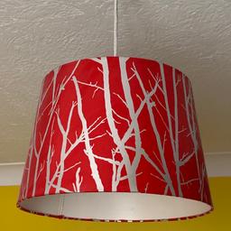 Lovely shade in very good condition. Red & silver. Can be used as ceiling or lamp shade.