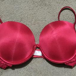 Shiny red padded t shirt bra from La Senza Size 36C.  Removable pads, lace trim comfy.