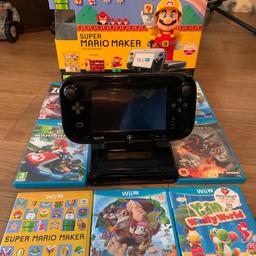 I am selling a used Nintendo Wii U black 32gb. This is in the Mario Maker box but does now contain the Mario amibo hence not advertising it as such.

7 great games:
Mario kart 8 
Zelda windwaker HD
ZombiU
Yoshi’s Woolly World
Mario Maker
Darksiders

Can deliver locally or post if required 

Any questions please ask