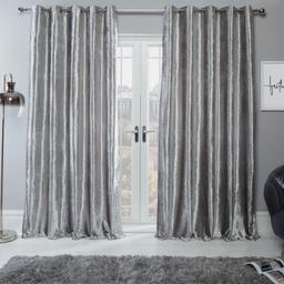 As new Sienna silver velvet curtains 45" x 90", fully lined in fantastic condition. I have 2 pairs, price is per pair. Please let me know whether you are interested in one or both pairs. No offers collection only wombwell.