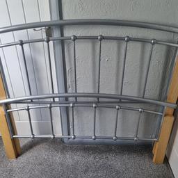 Pre-Loved Small Double Bed Frame

In Good Condition (Scuffs visible on the metal, see pictures) 
Made from Wood and Metal (So could easily be spray painted too look new) 

All Wooden Slats are present, one of the plastic slat holders is damaged but if placed at the foot of the bed this wouldn't be any issue (this is how I had it) 

Pick Up Birstall WF17 9BZ.              (5 minutes from Leeds ikea) 

Resonable Offers will be considered.